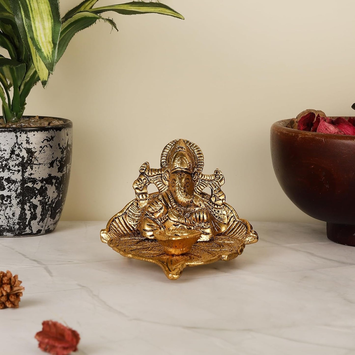 Antique Ganesh Idol on Leaf with Diya