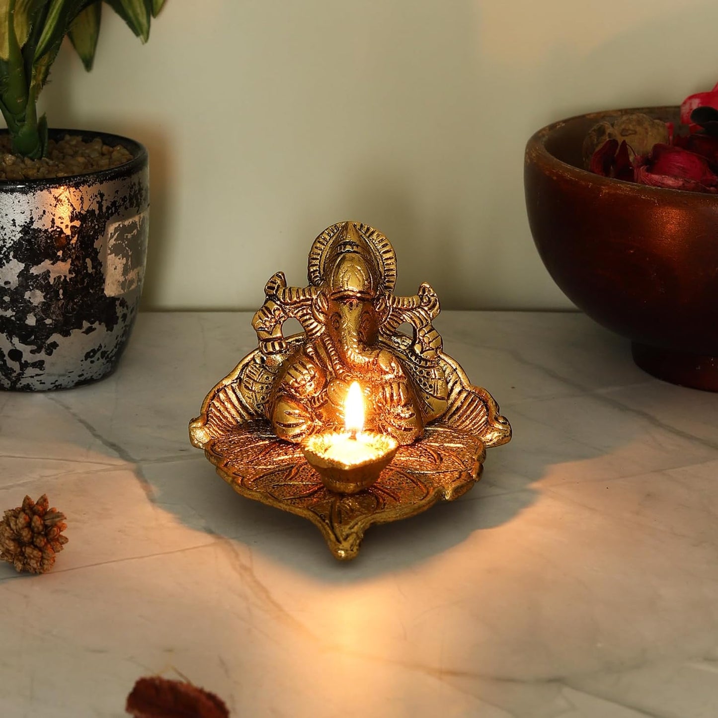 Antique Ganesh Idol on Leaf with Diya