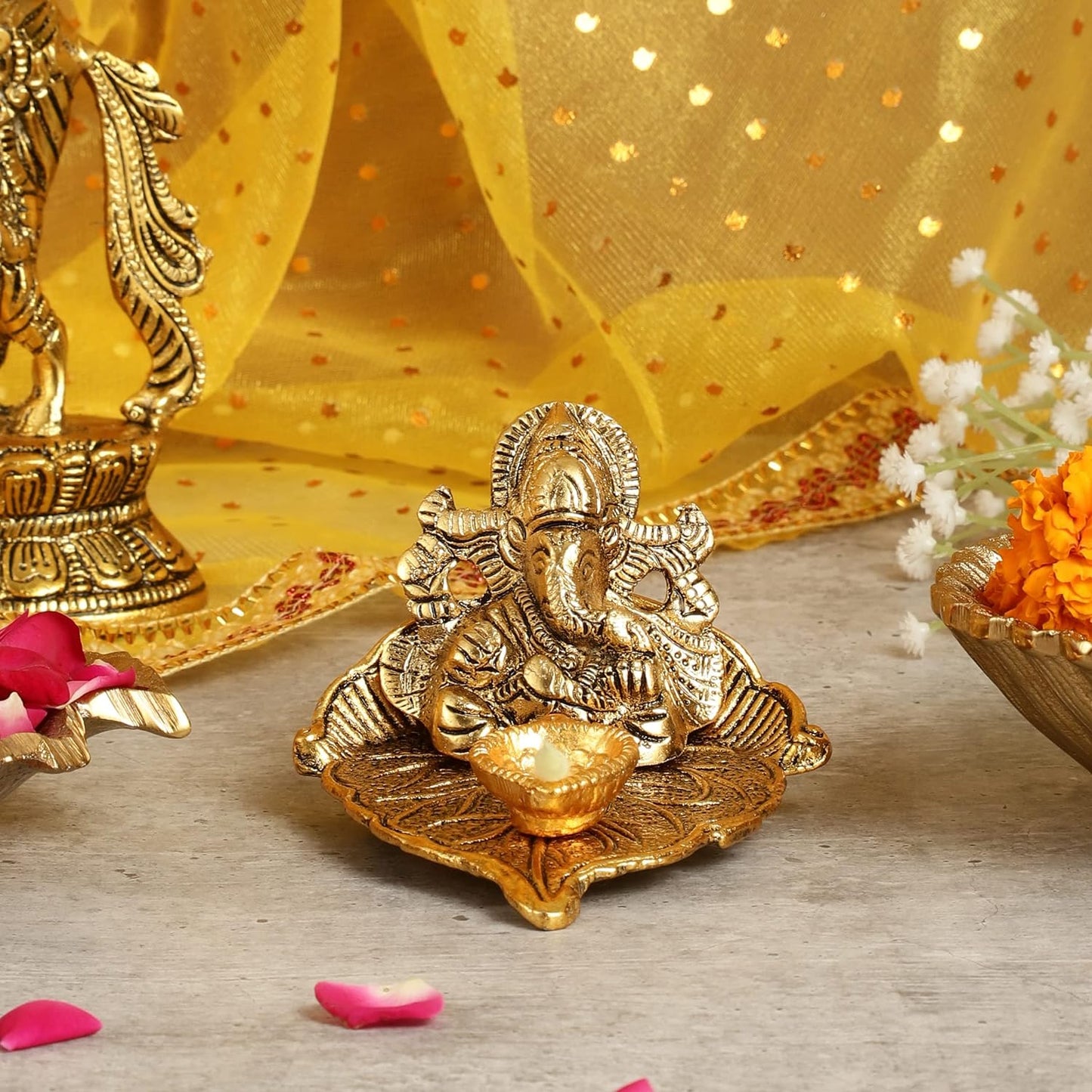 Antique Ganesh Idol on Leaf with Diya